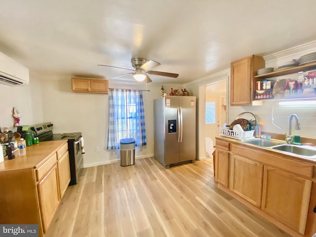 kitchen with stainless steel appliances, ceiling fan, light hardwood / wood-style flooring, crown molding, and sink