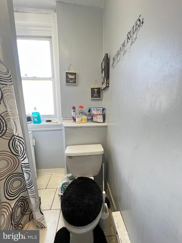 bathroom with tile floors