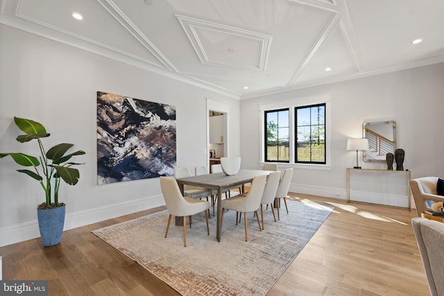 dining space with light hardwood / wood-style flooring