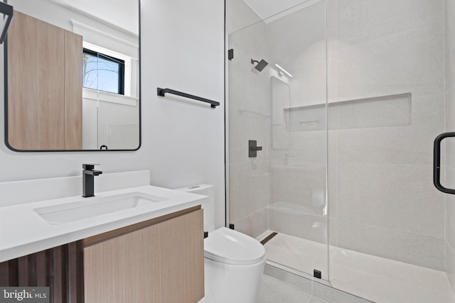 bathroom with vanity, toilet, and walk in shower