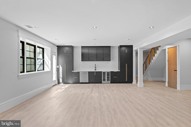 unfurnished living room with light hardwood / wood-style floors