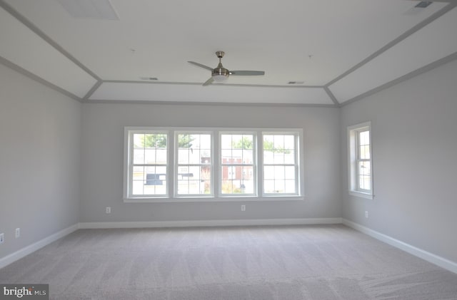 empty room with light carpet, ceiling fan, and lofted ceiling