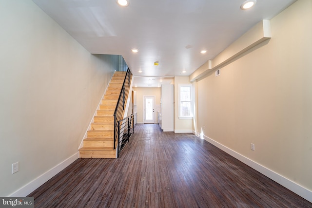 interior space with dark wood-type flooring