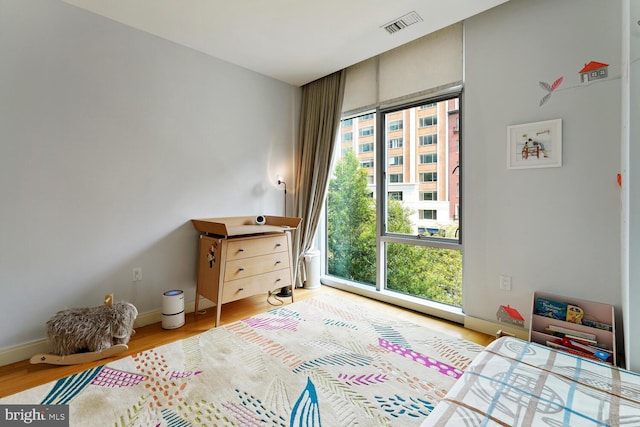 bedroom featuring light hardwood / wood-style floors