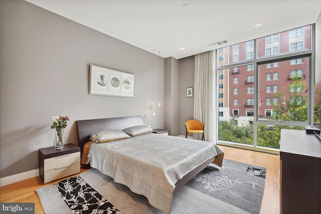 bedroom featuring light hardwood / wood-style floors