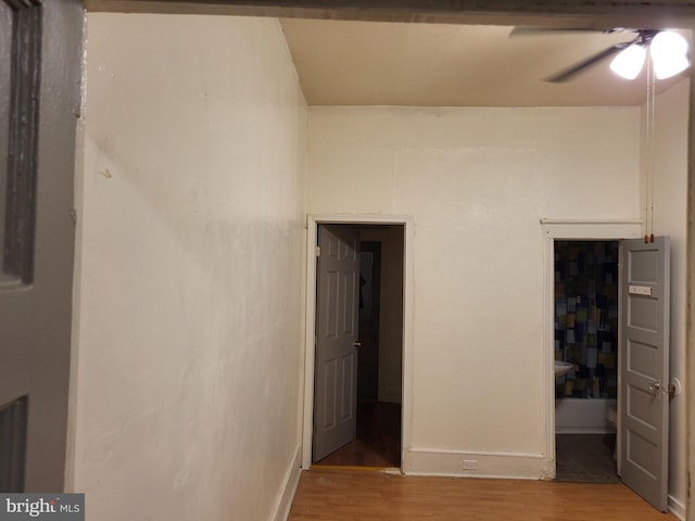 unfurnished bedroom featuring ceiling fan and hardwood / wood-style floors