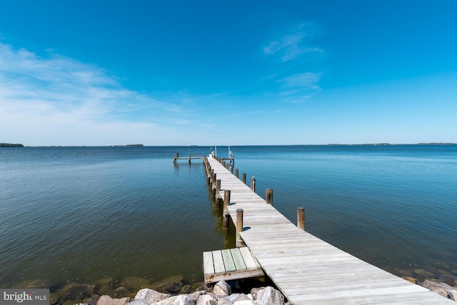 dock area featuring a water view and boat lift