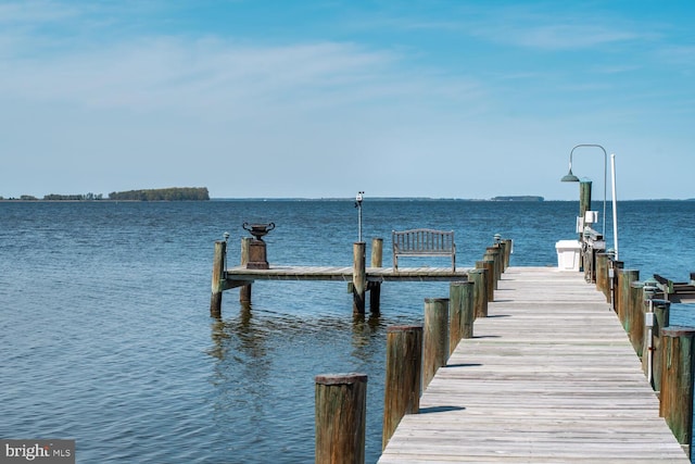 view of dock with a water view