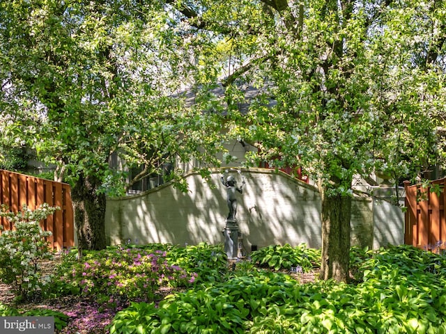 view of yard with fence