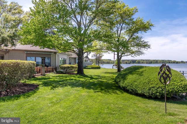 view of yard with a water view