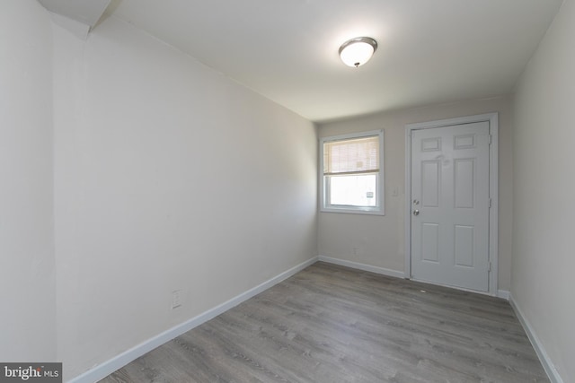 unfurnished room featuring light wood-type flooring