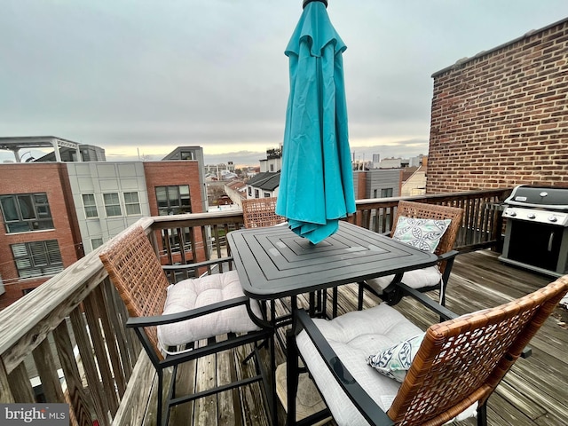 balcony featuring area for grilling