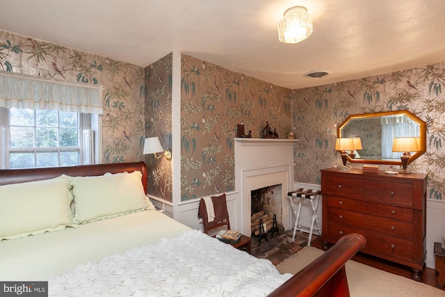 bedroom featuring wood-type flooring