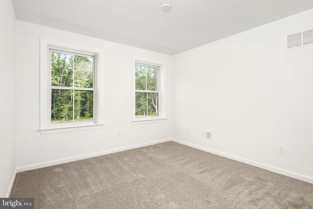 empty room with carpet floors