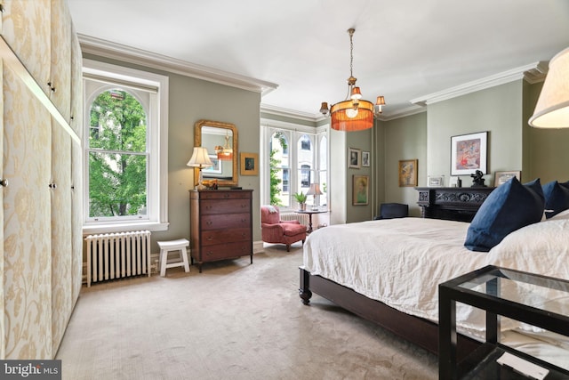 carpeted bedroom with radiator and crown molding