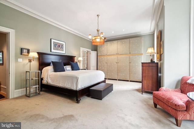 bedroom featuring carpet floors, an inviting chandelier, and ornamental molding