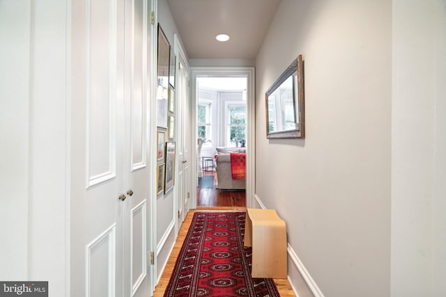 hall featuring hardwood / wood-style flooring