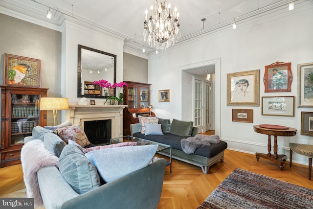 living room with parquet floors, an inviting chandelier, and ornamental molding