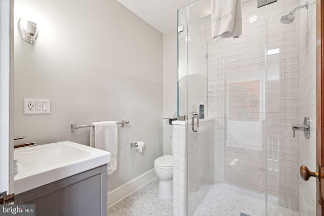 bathroom featuring an enclosed shower, toilet, tile flooring, and vanity