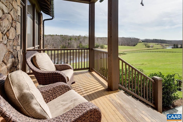 wooden deck with a yard