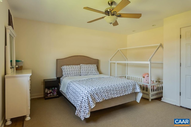 carpeted bedroom featuring ceiling fan