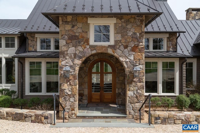 entrance to property featuring french doors