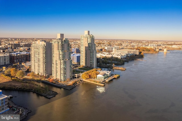 aerial view at dusk with a water view