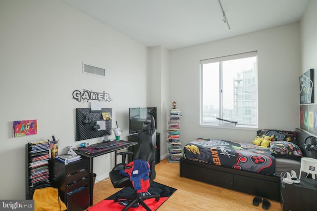 bedroom featuring light hardwood / wood-style flooring