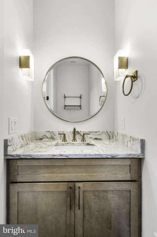 bathroom featuring oversized vanity