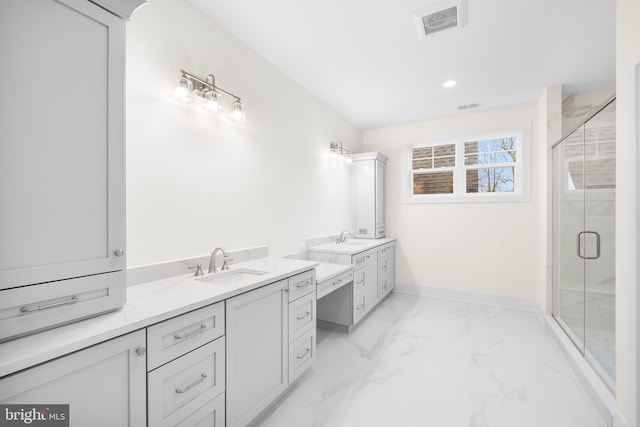 bathroom featuring double vanity, tile floors, and walk in shower