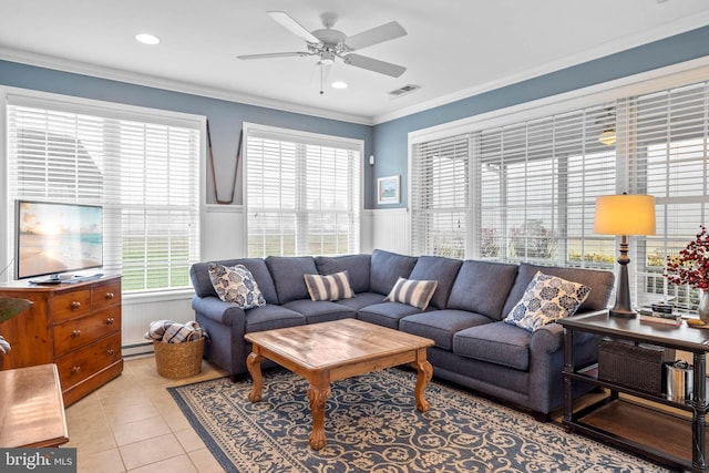 tiled living room featuring a baseboard radiator, crown molding, and ceiling fan