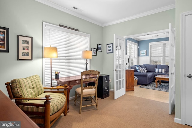 sitting room featuring crown molding, french doors, and light tile floors