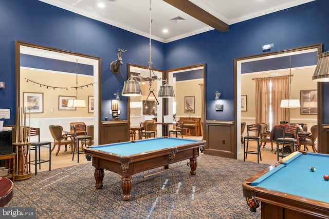 game room with dark colored carpet, beam ceiling, billiards, ornamental molding, and a high ceiling