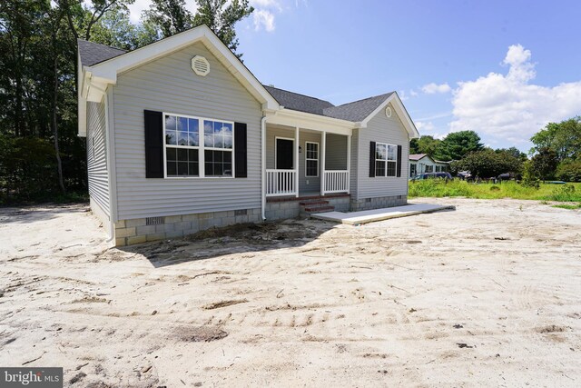 view of front of property featuring covered porch