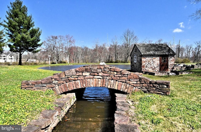 exterior space with a yard