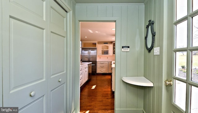 bathroom with hardwood / wood-style flooring, vanity, and plenty of natural light