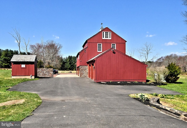 exterior space with a yard