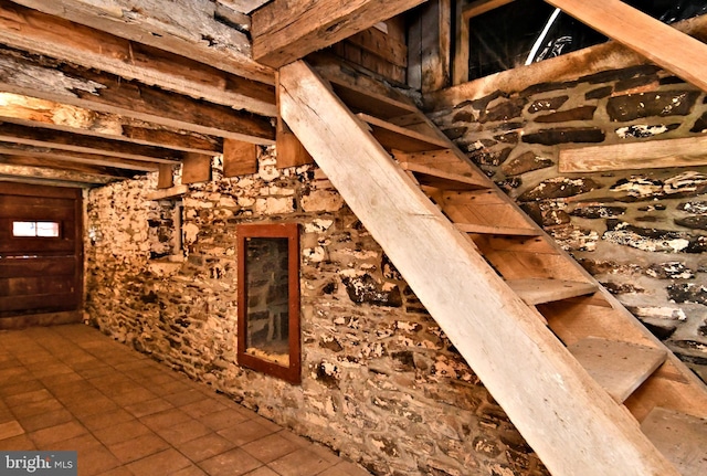 interior space featuring tile floors