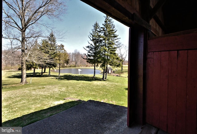 view of yard with a water view