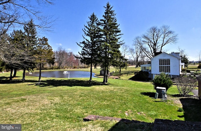 view of yard with a water view