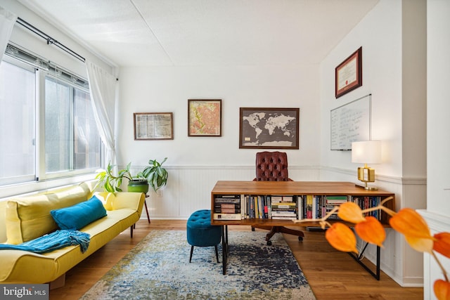 sitting room featuring light hardwood / wood-style flooring