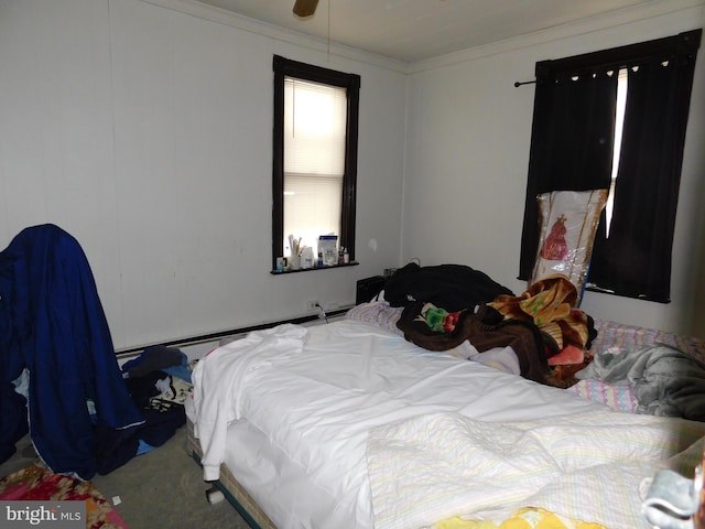 bedroom featuring a baseboard heating unit