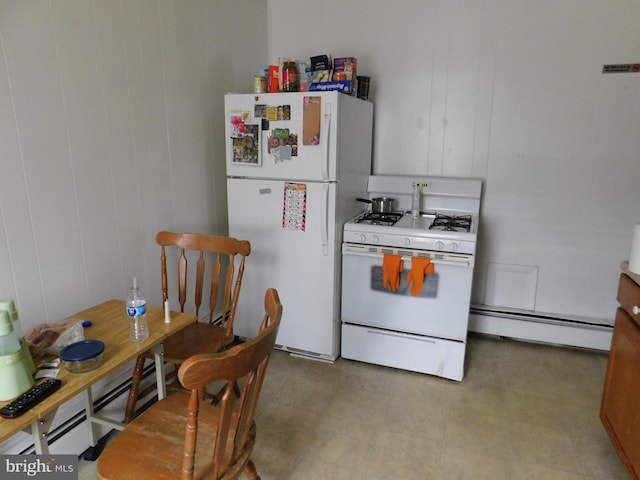 kitchen with baseboard heating, white appliances, and tile floors