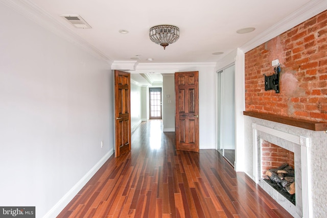 hall with crown molding and dark wood-type flooring