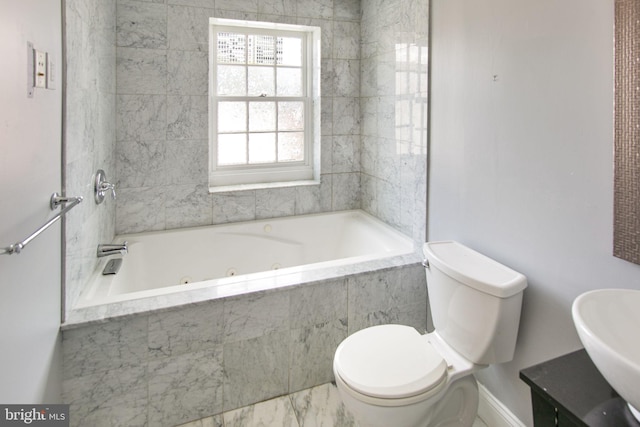 bathroom with sink, tile floors, and toilet