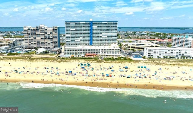 aerial view with a view of the beach and a water view