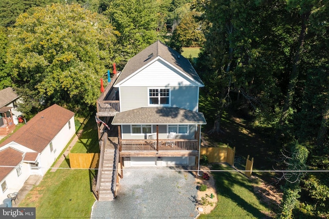 view of front facade with a front lawn and a garage