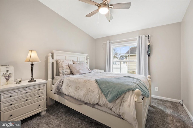 carpeted bedroom with ceiling fan and vaulted ceiling