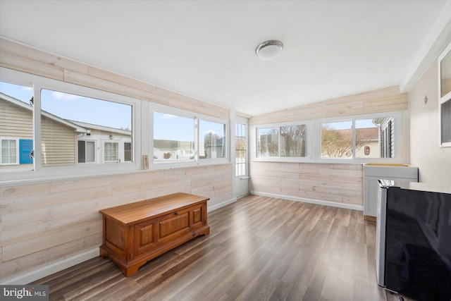 sunroom / solarium with vaulted ceiling