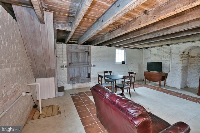 basement with tile patterned flooring